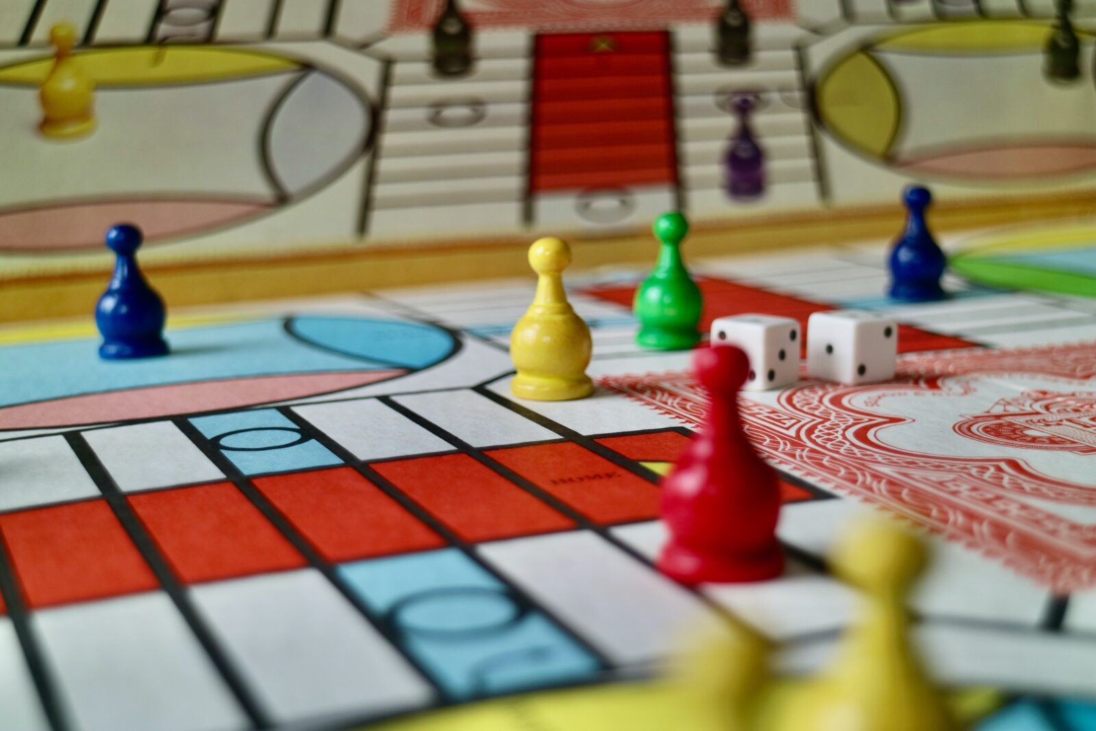 Dice and markers on a board game